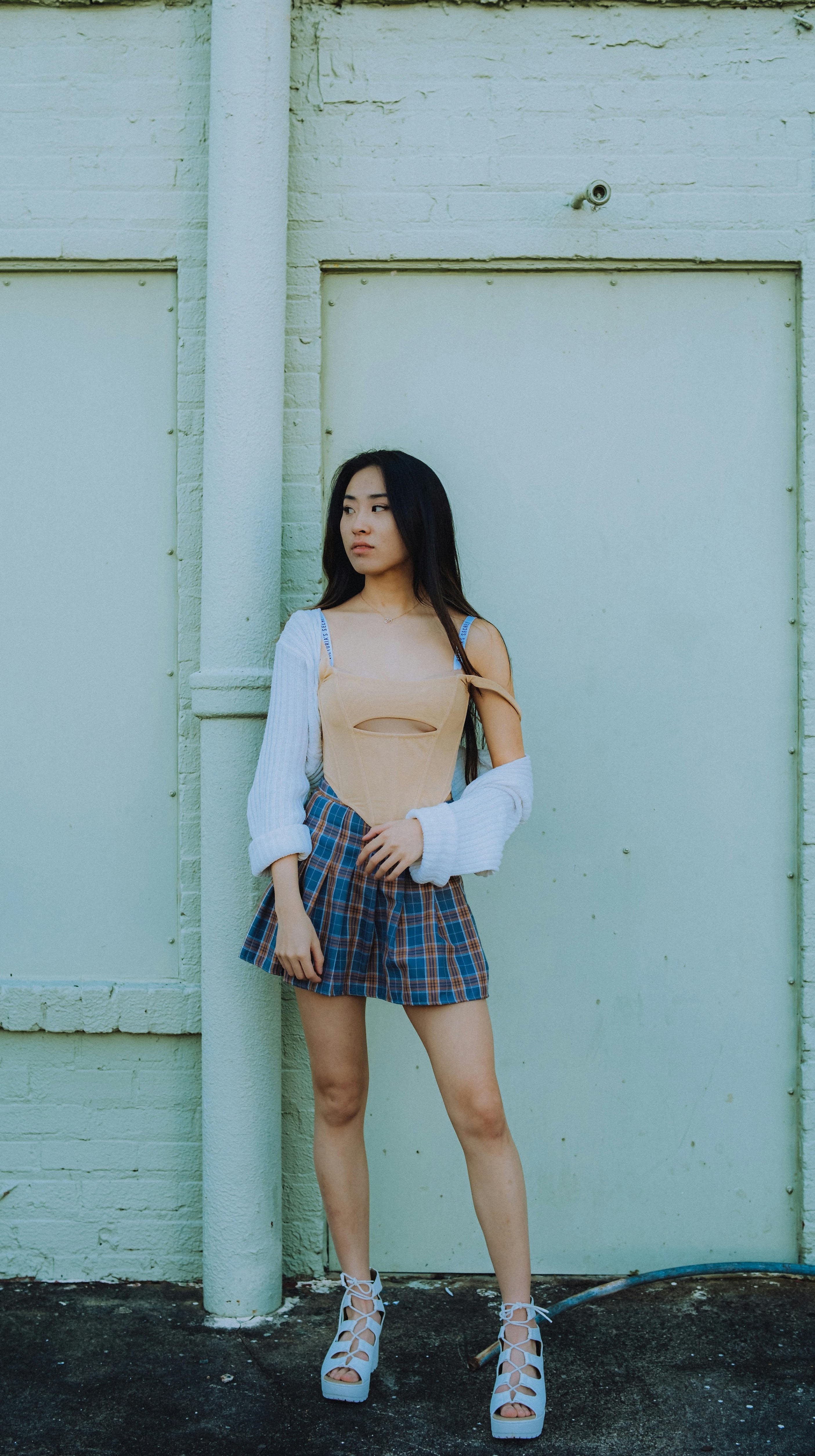 Minimal luxury outfit with architectural tailoring and polished finishes